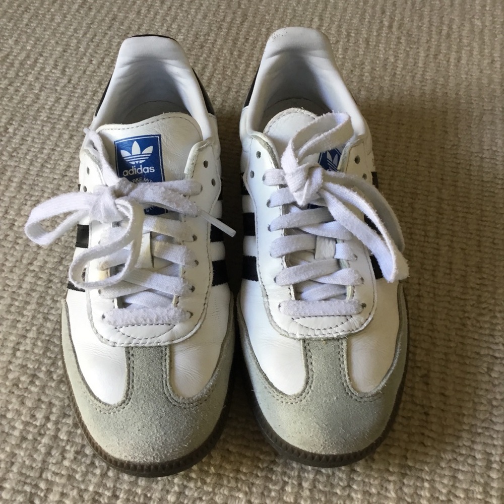 adidas White Sneakers with Black Stripes and Blue Tongue Logo